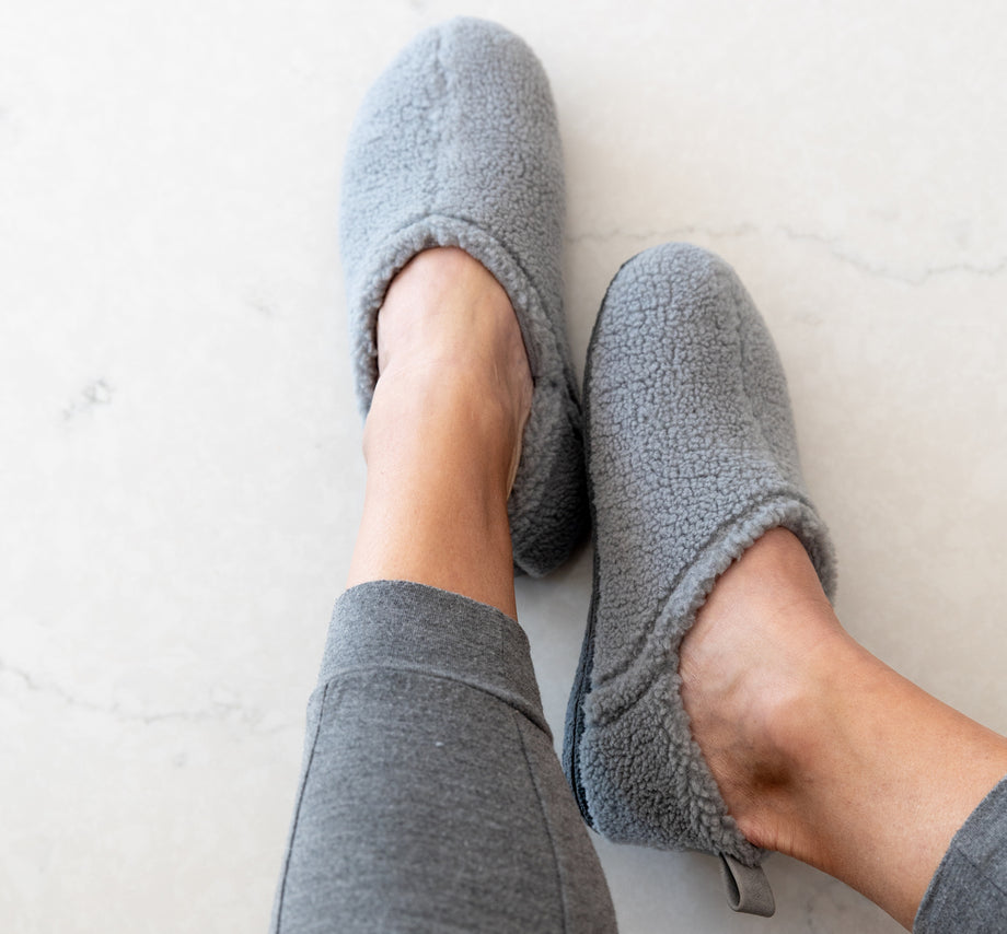 Slippers with backs online on them